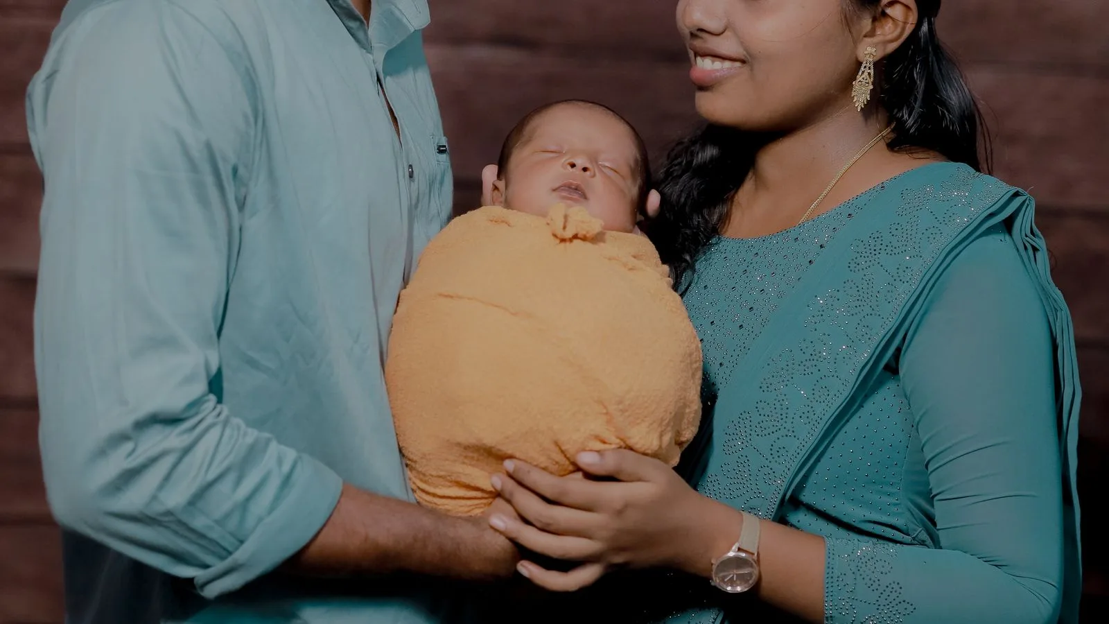 An Indian family spending time together with their young child